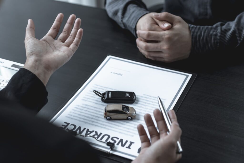 A Gainesville rideshare accident lawyer advising clients on what to expect during the insurance claim process.