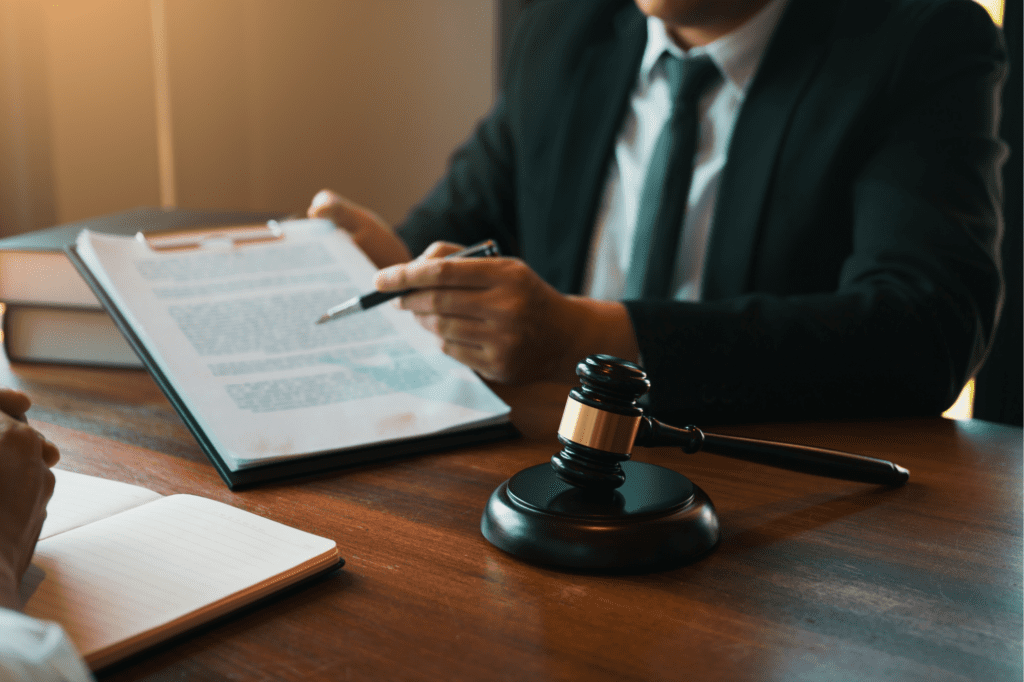 Attorney explaining Georgia's negligence laws to a client during a legal consultation.