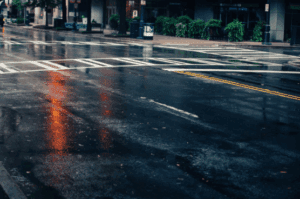 Poor driving road conditions from heavy rain.